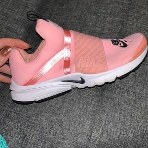 Nike shoes in very good condition size 6 pink with the black Nike embroidery.